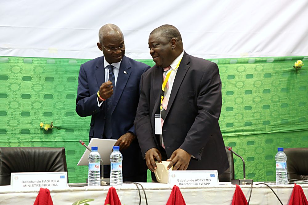 Hon. Minister of Power, Works & Housing, Mr Babatunde Fashola, SAN (left) and Director, Information and Control Centre of the West African Power Pool (WAPP) , Mr. Babatunde Adeyemo (right) during the Forum on Electricity Market Development in West Africa organized by WAPP at the Palais des Congres, Cotonou, Benin Republic on Monday 16th, January 2017