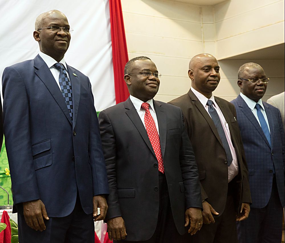 Hon. Minister of Power, Works & Housing, Mr Babatunde Fashola, SAN(left), Minister of Mines, Energy and Water of Benin, Mr Jean â€“ Claude Houssou (2nd left), Managing Director,  Transmission Company of Nigeria (TCN), Dr. Abubakar Atiku (2nd right) ,Secretary General of  West African Power Pool (WAPP), Siengui Apollinaire Ki ( right) in a group photograph shortly after the Opening Session of the Forum on Electricity Market Development in West Africa organized by the West African Power Pool (WAPP) at the Palais des Congres, Cotonou, Benin Republic on Monday 16th, January 2017