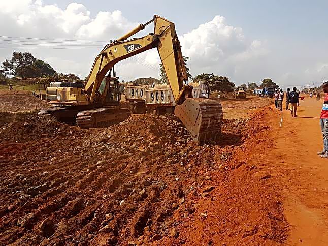 Work in Progress.  Personnel of Mothercat Limited working on the dualization and  construction of additional carriageway on the Lokoja-Benin Road (Section II: Okene-Auchi, 26.70km) running through Kogi and Edo States and also entails the construction of a new two lane travel way of 63. 7Km length running side by side the existing road as part of the on going expansion and rehabilitation of roads across the country by the Federal Ministry of Power, Works and Housing under the 2016 Budget