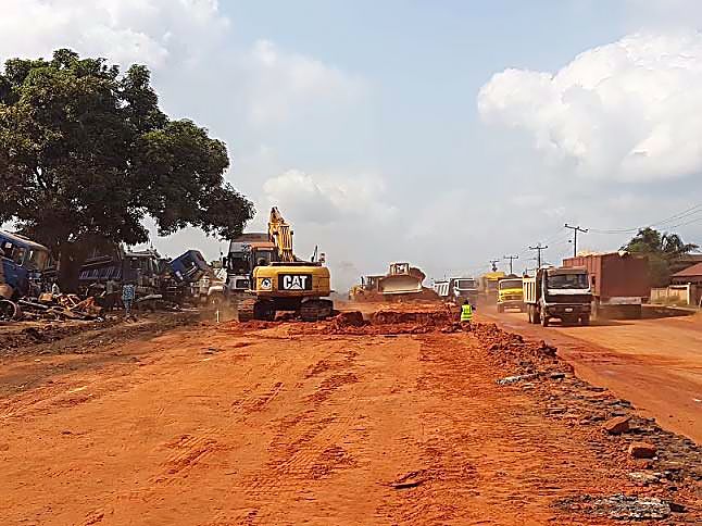 Work in Progress.  Personnel of Mothercat Limited working on the dualization and  construction of additional carriageway on the Lokoja-Benin Road (Section II: Okene-Auchi, 26.70km) running through Kogi and Edo States and also entails the construction of a new two lane travel way of 63. 7Km length running side by side the existing road as part of the on going expansion and rehabilitation of roads across the country by the Federal Ministry of Power, Works and Housing under the 2016 Budget