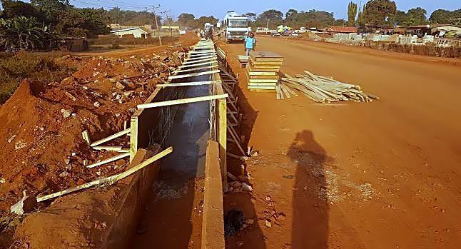 Work in Progress.  Personnel of Mothercat Limited working on the dualization and  construction of additional carriageway on the Lokoja-Benin Road (Section II: Okene-Auchi, 26.70km) running through Kogi and Edo States and also entails the construction of a new two lane travel way of 63. 7Km length running side by side the existing road as part of the on going expansion and rehabilitation of roads across the country by the Federal Ministry of Power, Works and Housing under the 2016 Budget