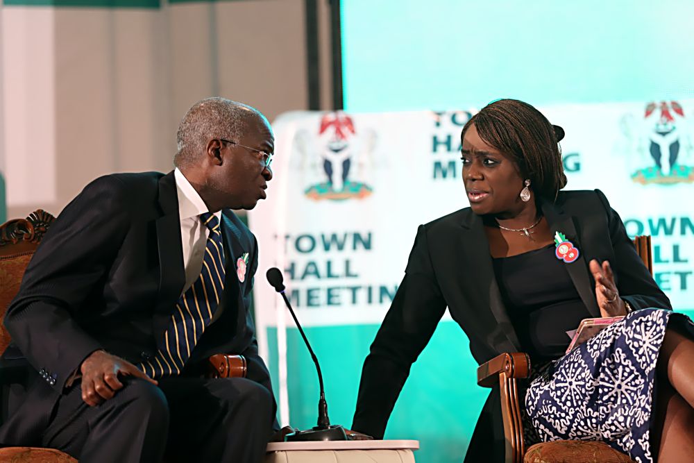 Hon.Minister of Power, Works & Housing, Mr Babatunde Fashola,SAN ( left) and Hon.  Minister of Finance, Mrs Kemi Adeosun (middle)  during the Special Town Hall Meeting with Youths organized by the Federal Ministry of Information and Culture at the Banquet Hall, State House Abuja on Tuesday 20th December, 2016