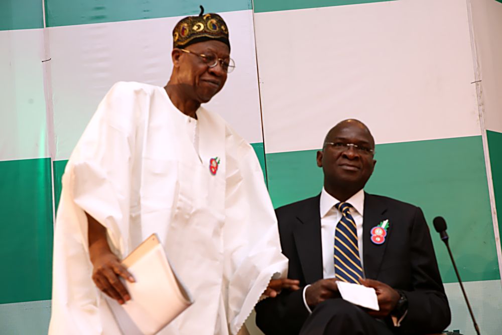 Hon.Minister of Power, Works & Housing, Mr Babatunde Fashola,SAN (right) and Hon. Minister of Information and Culture, Mr Lai Muhammed(left)  during the Special Town Hall Meeting with Youths organized by the Federal Ministry of Information and Culture at the Banquet Hall, State House Abuja on Tuesday 20th December, 2016