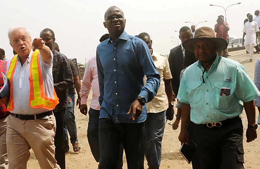 Hon.Minister of Power, Works & Housing, Mr Babatunde Fashola,SAN (middle),Federal Controller of Works,Lagos State, Engr. Godwin Eke(right) and  Joint Managing Director, Boroni Prono & Company Nigeria Limited, Engr. Gianfranco Albertazzi (left) during an inspection tour of the Rehabilitation of Lagos Ring Road Bridge Abutment and Approach Ramp of the Third Mainland Bridge in Lagos State on Tuesday 3rd, January 2017