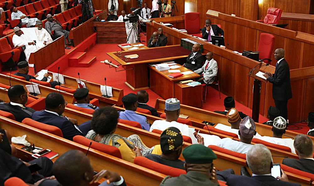 Minister of Power, Works & Housing, Mr Babatunde Fashola, SAN (middle) and others during a Briefing of the Senate on the Planned Closure of the Nnamdi Azikwe International Airport, Abuja Runway for Repairs at the Senate Chamber on Tuesday, 17th January  2017