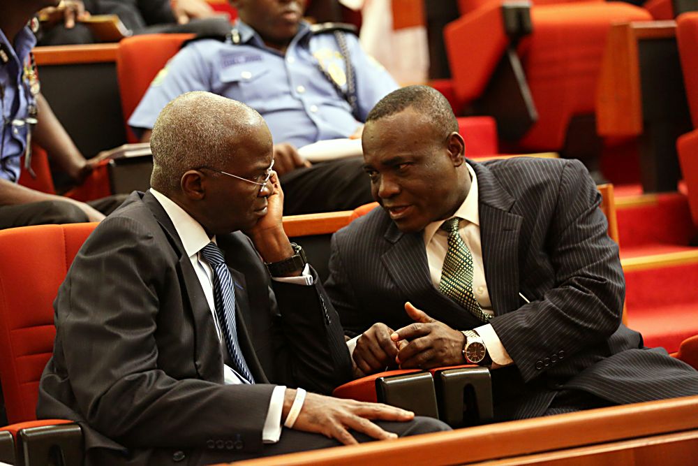 Minister of Power, Works & Housing, Mr Babatunde Fashola, SAN (left) and Senior Special Assistant to the President on National Assembly Matters, Senator Ita Enang(right) during a Briefing of the Senate on the Planned Closure of the Nnamdi Azikwe International Airport, Abuja Runway for Repairs at the Senate Chamber on Tuesday, 17th January  2017