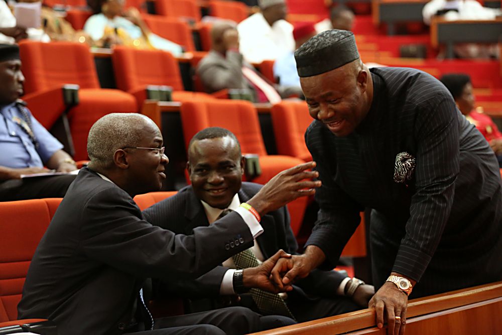 Minister of Power, Works & Housing, Mr Babatunde Fashola, SAN (left), Senior Special Assistant to the President on National Assembly Matters, Senator Ita Enang (middle) and Majority Leader of the Senate, Senator Goodwill Akpabio(right)  during a Briefing of the Senate on the Planned Closure of the Nnamdi Azikwe International Airport, Abuja Runway for Repairs at the Senate Chamber on Tuesday, 17th January  2017