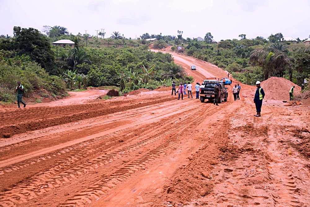 Personnel of  Bekskimse  Nigeria Limited at work during the inspection of the ongoing  Rehabilitation of Arochukwu -Ohafia - Abiriba Road Umuhia  on the second day of  inspection tour of Highway Projects in the South -East Zone of the country by Hon. Minister of Power,Works and Housing, Mr Babatunde Fashola SAN on Friday 3rd, February 2017