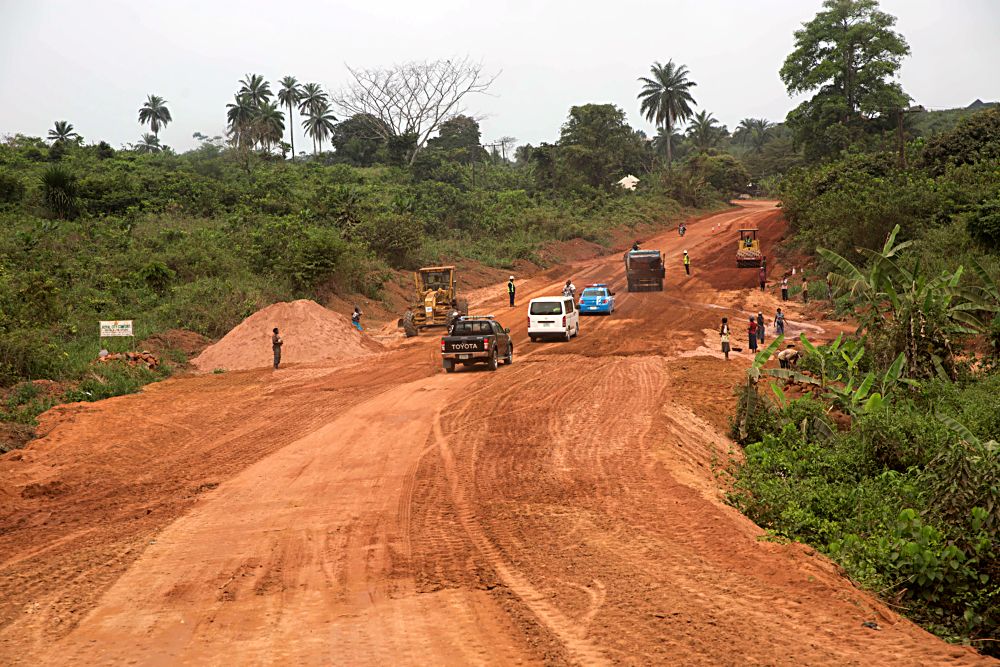 Personnel of  Bekskimse  Nigeria Limited at work during the inspection of the ongoing  Rehabilitation of Arochukwu -Ohafia - Abiriba Road Umuhia  on the second day of  inspection tour of Highway Projects in the South -East Zone of the country by Hon. Minister of Power,Works and Housing, Mr Babatunde Fashola SAN on Friday 3rd, February 2017