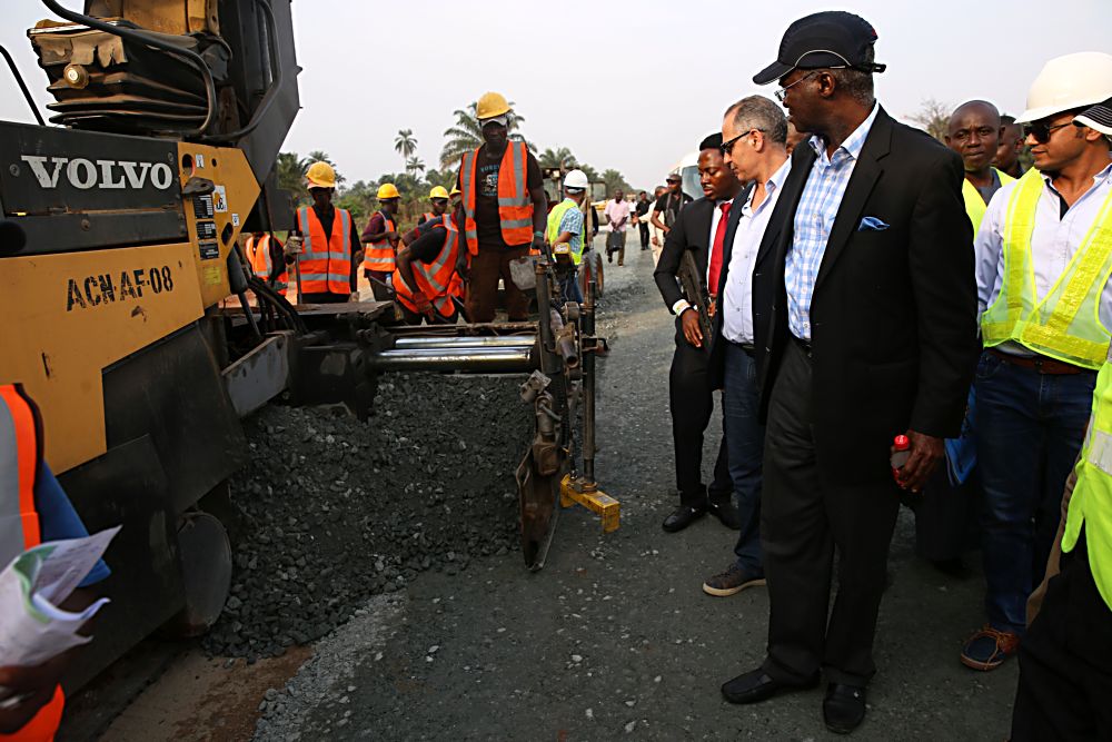 Hon. Minister of Power, Works & Housing, Mr Babatunde Fashola,SAN(right), Managing Director, Arab Contractors Nigeria Limited, Engr. Sarah Radwan (left) and others during the inspection tour of the ongoing construction work on the Rehabilitation of Enugu - Port Harcourt Dual Carriageway Section II on Thursday 2nd, February 2017