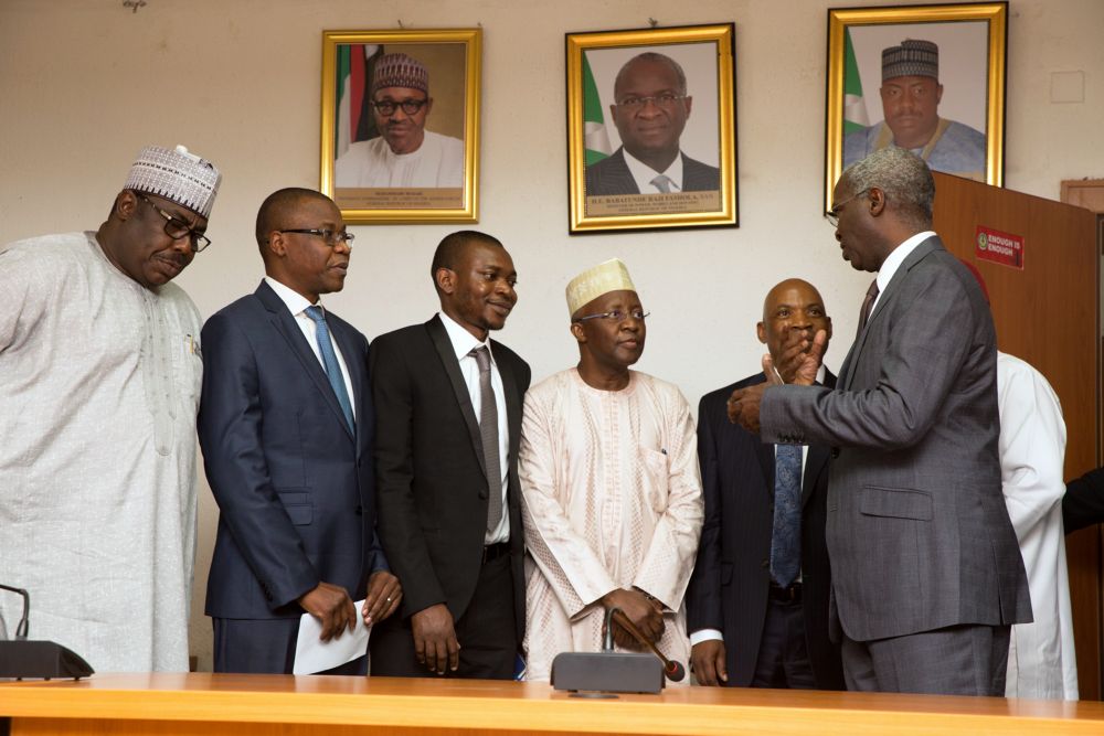 Minister of Power, Works & Housing, Mr Babatunde Fashola, SAN (right), the Minister of State in the Ministry, Hon. Mustapha Baba Shehuri(left),Vice Chairman and Commissioner representing North West, Engr.Sanusi Garba(3rd right); Commissioner representing South West, Dr Musiliu Oseni(3rd left); Commissioner representing North East, Mr Nathan Shatti(2nd left); and Commissioner representing South East, Prof. Frank Okafor(2nd right) during the Inauguration of the Vice Chairman and Commissioners of the Nigerian Electricity Regulatory Commisssion (NERC) at the Ministry of Power, Works & housing Headquarters, Mabushi onTuesday 7th,  February 2017