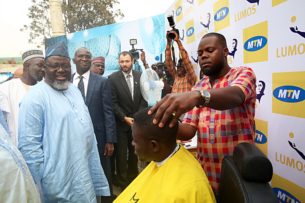 Hon. Minister of Power, Works & Housing, Mr Babatunde Fashola,SAN(middle),Hon.Â Minister of Communications , Mr Adebayo Shittu(left) andÂ CEO Lumos Nigeria, Mr Yuri Tsitrinbaum(left)Â during the launch of the Mobile Electricity Service by MTN at theÂ Transcorp Hilton Hotel, Abuja on Monday 21, February 2017