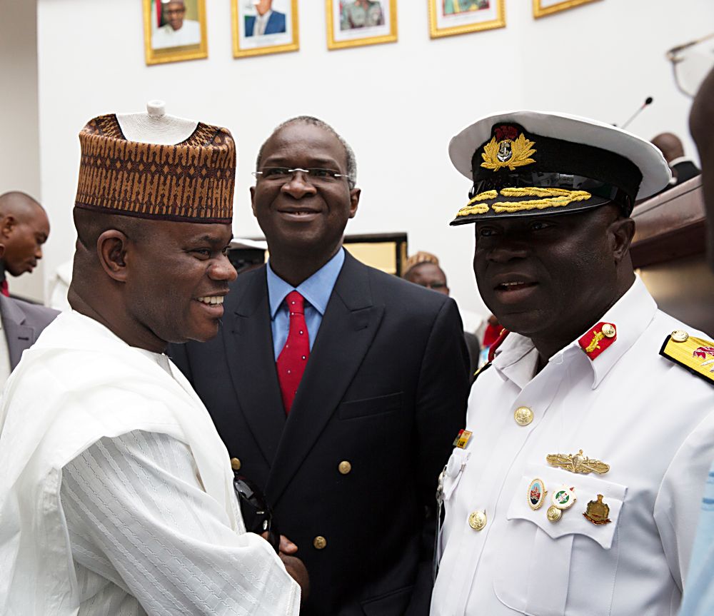 Hon Minister of Power Works  Housing Mr Babatunde FasholaSANmiddleCommandant National Defence College Rear Admiral Samuel IIesanmi Aladeright and Governor of Kogi State Alhaji Yahaya Bello leftshortly after the Opening Session of the 7th Edition of the National Security Seminar 2017 organized by the Alumni Association of the National Defence College with the theme 