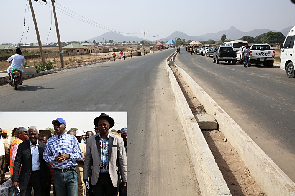 The completed Jalingo KonaLauKarim Lamido Phase l Federal HighwayINSET Hon Minister of Power Works  Housing Mr Babatunde Fashola SAN middle Commissioner of Works  Transportation Taraba State Dr Tafarki Eneme right and Managing Director Moulds Nigeria Limited Engr Samuel Oyefemileft during the Hon Ministers inspection tour of the completed Jalingo KonaLauKarim Lamido Road Phase l built in partnership with the State Government in Taraba State  on Friday 17 March 2017