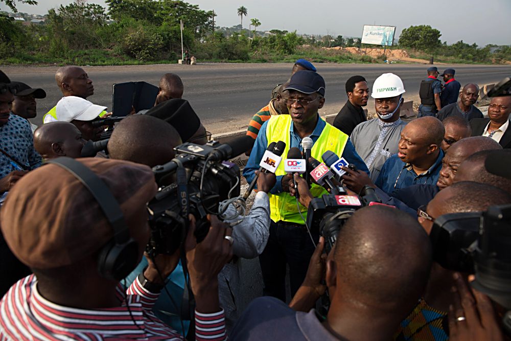 Hon Minister of Power Works  Housing Mr Babatunde FasholaSAN2nd right flanked by Director Highways Construction and Rehabilitation Engr Yemi Oguntominiyimiddle and others speaking with Journalists during  the Ministers inspection tour of the  ongoing construction work of Rehabilitation Reconstruction and Expansion of Lagos  Ibadan ExpresswaySection IIShagamu Ibadan Federal HighwayOgun State on Day Two of his inspection tour of Highway Projects in the South West Zone of the country on  Friday 24 March 2017