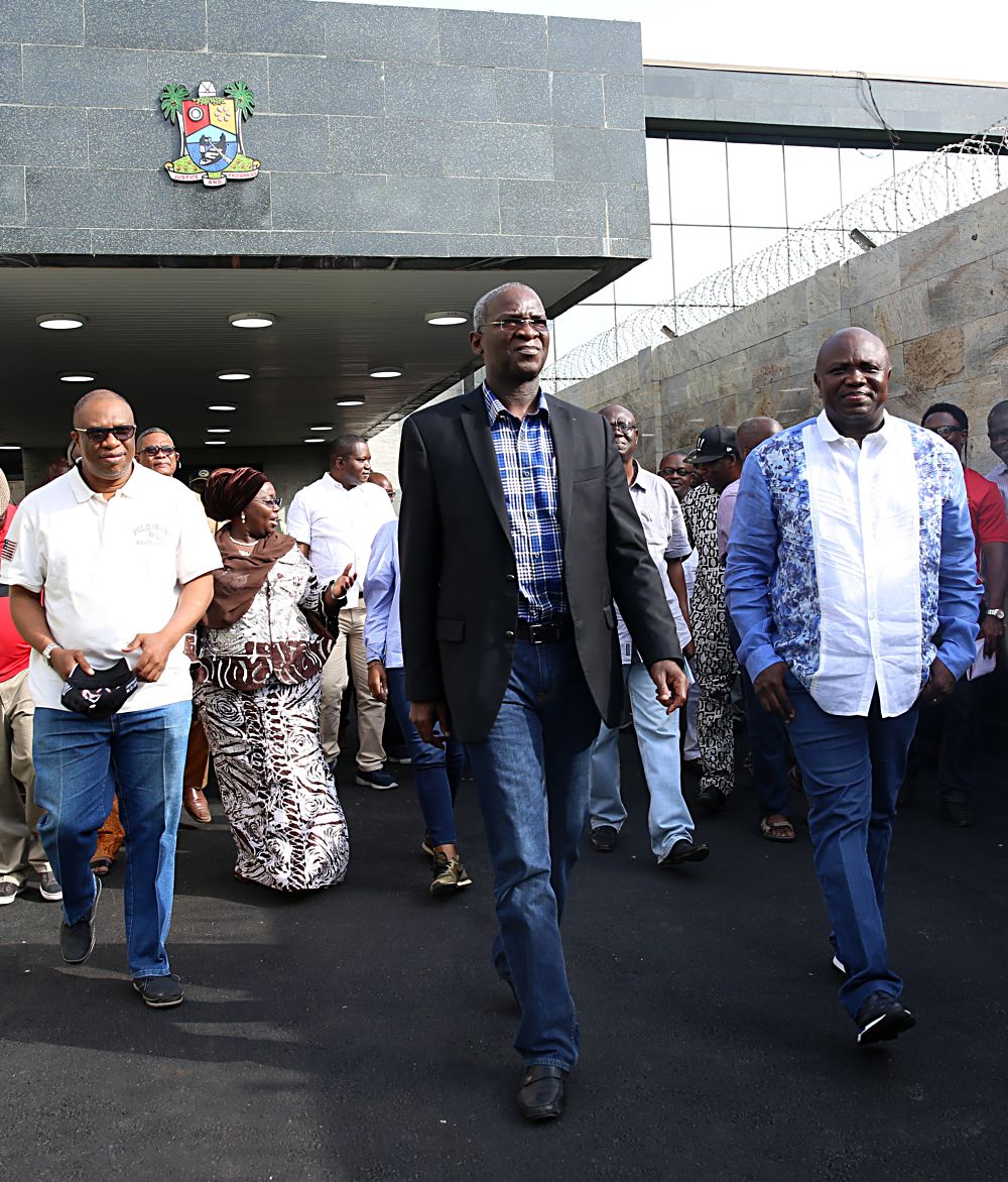 Hon Minister of Power Works  Housing Mr Babatunde FasholaSAN middle Governor of Lagos State Mr Akinwunmi Amboderight and Director Highways Construction and Rehabilitation Engr Yemi Oguntominiyileft during the Hon Ministers courtesy call after an  inspection tour of the  ongoing construction work of the Rehabilitation Reconstruction and Expansion of Lagos Ibadan Expressway Section IShagamu Lagos on Day Three of his inspection tour of Highway Projects in the South West Zone of the country on  Saturday 25th March 2017