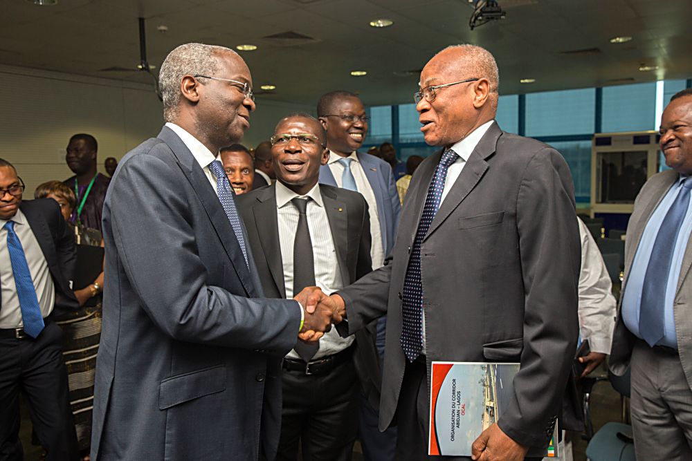 Hon Minister of Power Works  Housing and the Chairman of Steering Committee Mr Babatunde Fashola SAN left Hon Minister of Infrastructure  Transport Togolese Republic  Mr Ninsao Gnofammiddle and DG Pal Mr Adegnon Fogan right during the 7th Steering Committee Meeting on the Abijan  Lagos Corridor Highway Development Programme at the EcoBank Transnational Inc ETI Lome Togolese Republic on Friday 31st March 2017