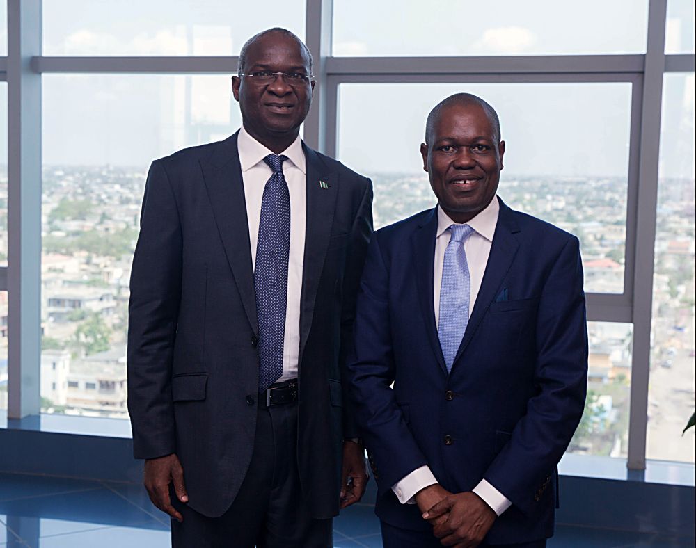 Hon Minister of Power Works  Housing and the Chairman of Steering Committee Mr Babatunde Fashola SAN left and Group Chief Executive Officer Ecobank Mr Ade Adeyemiright shortly before  the 7th Steering Committee Meeting on the Abidjan  Lagos Corridor Highway Development Programme at the EcoBank Transnational Inc ETI Lome Togolese Republic on Friday 31st March 2017