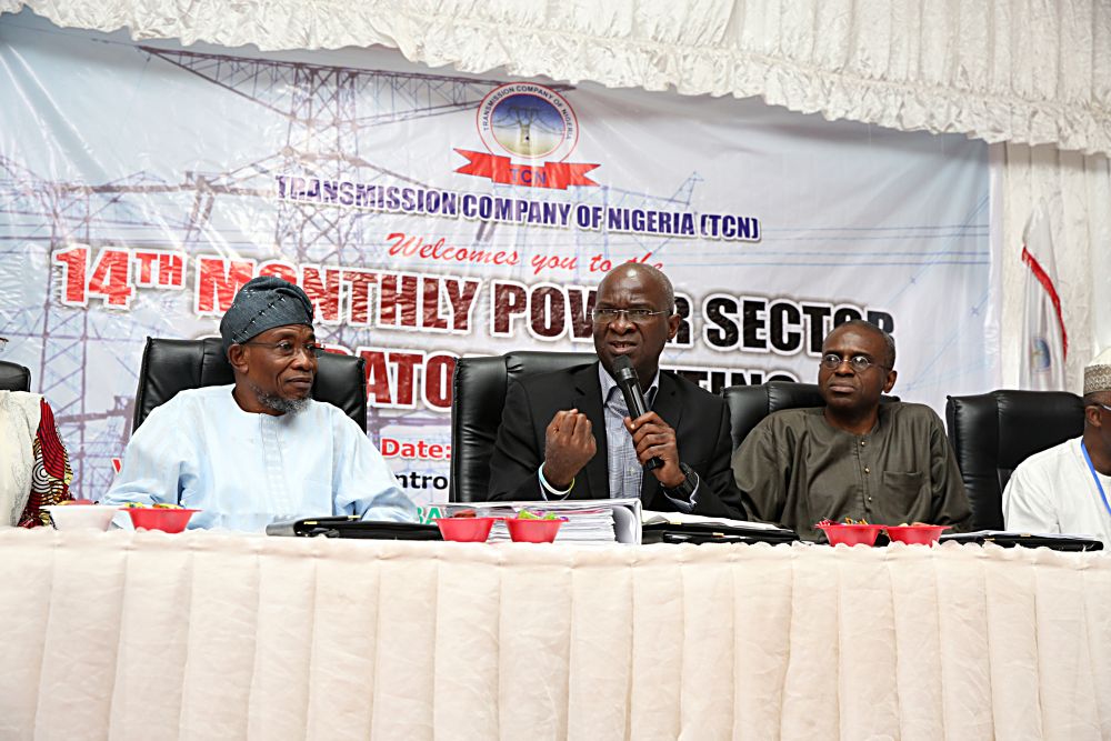 Hon Minister of Power Works  HousingMr Babatunde Fashola SANmiddle Governor State of Osun Ogbeni Rauf Aregbesolaleft Permanent Secretary Power in the Ministry Mr Louis Edozien2nd right  during the 14th Monthly Meeting with Sectoral Paricipants in the Power Sector hosted by Transmission Company of NigeriaTCN at the National Control Centre NCC Osogbo Osun State on Monday 10thMarch 2017