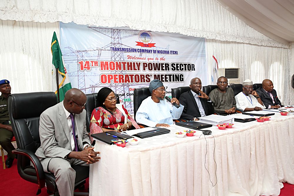 Hon Minister of Power Works  Housing Mr Babatunde Fashola SANmiddle Permanent Secretary Power in the Ministry Mr Louis Edozien3rd right Vice Chairman Nigerian Electricity Regulatory  CommissionNERC Engr Sanusi Garba2nd right Interim MDCEO Governor State of Osun Ogbeni Rauf Aregbesola3rd left and Deputy Governor Mrs Titilayo  Laoye2nd left and Transmission Company of NigeriaTCN Mr Usman Mohammedleft  during the 14th Monthly Meeting with Sectoral Paricipants in the Power Sector hosted by the Transmission Company of NigeriaTCN at the National Control Centre NCC Osogbo Osun State on Monday 10th  March 2017