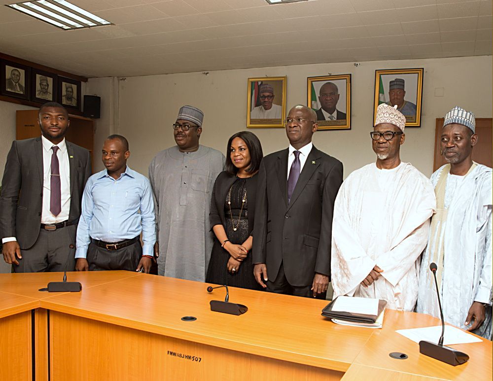 Hon Minister of Power Works  Housing Mr Babatunde Fashola SAN3rd rightthe Minister of State in the Ministry Hon Mustapha Baba Shehuri3rd leftChairman Board of Rural Electrification AgencyREAEngr Umaru Maza Maza2nd rightChief Executive OfficerManaging DirectorRural Electrification AgencyREAMrs Damilola Ogunbiyimiddle Executive DirectorRural Electrification FundDr Sanusi Mohammed Ohiareright Executive Director Technical Services Engr Muhammed Wasaramleftand Non  Executive DirectorEngr Mac Solomon Alozie 2nd left in a group photograph shortly after the inauguration of the Board of Rural Electrification AgencyREAat the Ministry of Power Works  Housing Headquarters Mabushi Abuja on Tuesday 2nd May 2017