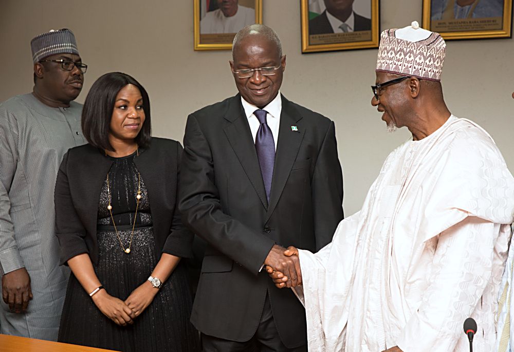 Hon Minister of Power Works  Housing Mr Babatunde Fashola SAN2nd rightthe Minister of State in the Ministry Hon Mustapha Baba ShehurileftChairman Board of Rural Electrification AgencyREAEngr Umaru Maza Mazaright andChief Executive OfficerManaging DirectorRural Electrification AgencyREAMrs Damilola Ogunbiyi2nd leftshortly after the inauguration of the Board of Rural Electrification Agency REAat the Ministry of Power Works  Housing Headquarters Mabushi Abuja on Tuesday 2nd May 2017