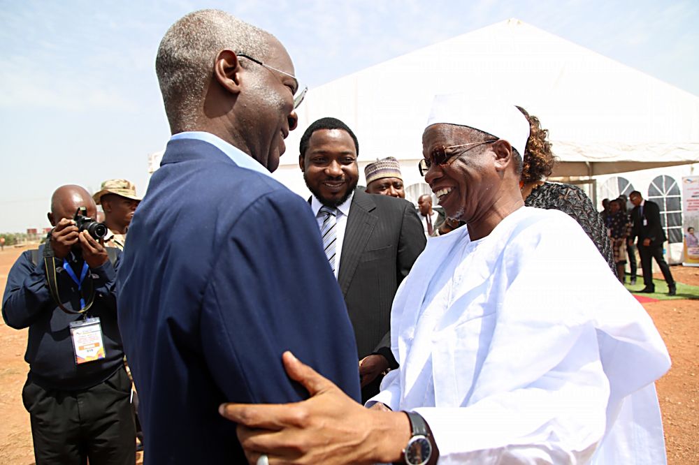 Hon Minister of Power Works  Housing Mr Babatunde Fashola SANleft being welcomed by the Chairman Jos Electricity Distribution Plc Alh Yayale Ahmedright during the 15th Monthly Meeting with Sectoral Participants in the Power Sector hosted by Jos Electricity Distribution Plc at the NIPP Injection SubStation Lamingo Jos Plateau State on Monday 8th May 2017