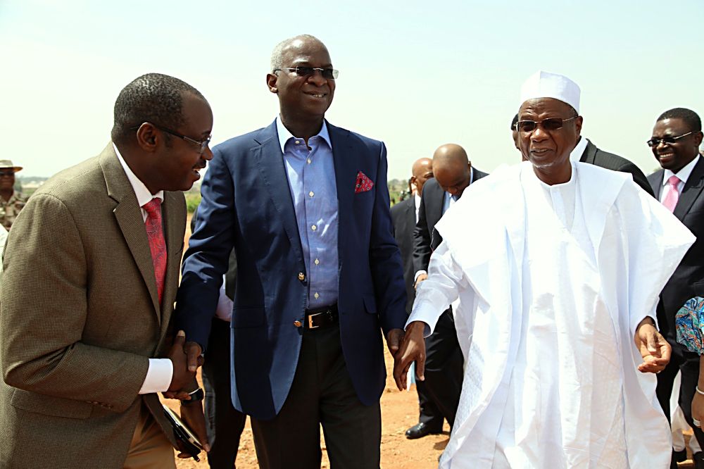 Hon Minister of Power Works  Housing Mr Babatunde Fashola SAN middle CEOManaging Director of Transmission Company of NigeriaTCN Mr Usman Gur Mohammed left and Chairman Jos Electricity Distribution Plc Alh Yayale Ahmedright during the 15th Monthly Meeting with Sectoral Participants in the Power Sector hosted by Jos Electricity Distribution Plc at the NIPP Injection SubStation Lamingo Jos Plateau State on Monday 8th May 2017