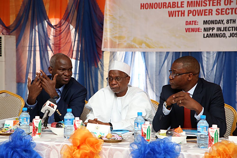 Hon Minister of Power Works  Housing Mr Babatunde Fashola SANleft Commissioner Finance  Management Services NERC Mr Nathan Rogers Shatti right and Chairman Jos Electricity Distribution Plc Alh Yayale Ahmed middle during the 15th Monthly Meeting with Sectoral Participants in the Power Sector hosted by Jos Electricity Distribution Company at the NIPP Injection SubStation Lamingo Jos Pleateau State on Monday 8th May 2017