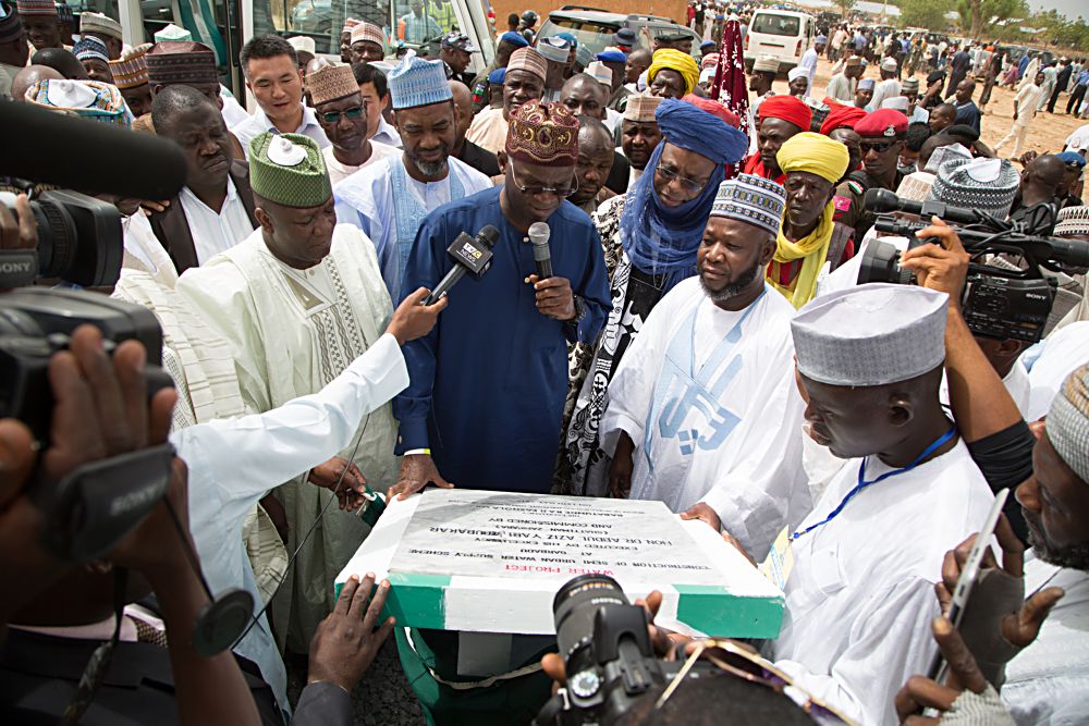 Hon Minister of Power Works  Housingand Special Guest of Honour Mr Babatunde Fashola SAN2nd leftGovernor of Zamfara State Dr AbdulAziz Yari AbubakarleftEmir of Talatan Mafara Zamfara State Alh Bello Mohammad Barmo2nd right Commissioner Ministry for Local Government  Chieftaincy Affairs Zamfara State Hon Muttaka Muhammad Riniright and others during the commissioning of 84 Units of Solar Powered Motorized Borehole as part of the activities to commemorate the6th Anniversary of Governor Yaris administration inZamfara State on Monday 15th May 2017