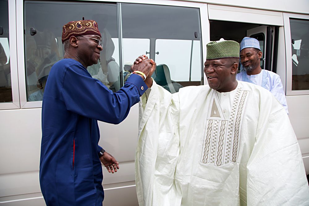 Hon Minister of Power Works  Housing and Special Guest of Honour Mr Babatunde Fashola SANright and Governor of Zamfara State Dr AbdulAziz Yari Abubakarleft shortly after the commissioning of newly procured fire fighting equipment for the State Fire Serviceas part of activities to commemorate the 6thAnniversary of Governor Yaris administration inZamfara State on Monday 15th May 2017