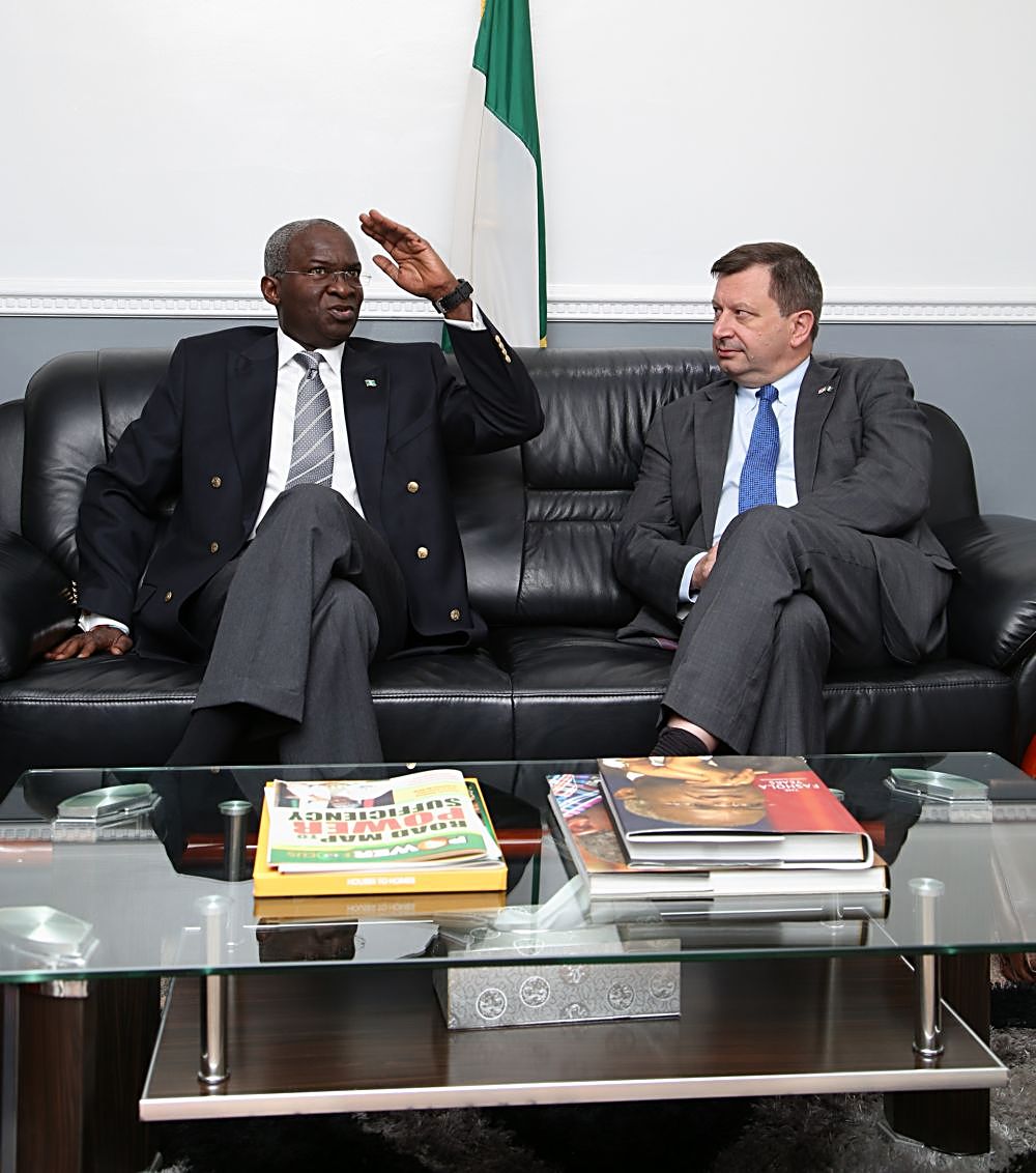 Hon Minister of Power Works  Housing Mr Babatunde Fashola SAN left and the British High Commissioner to Nigeria HE Mr Paul Arkwrightright to discuss issues relating to the development of the nations Power Sector  and Infrastructure with the Hon Minister  at the Ministry of Power Works  Housing Headquarters Mabushi Abuja on Tuesday 16th May 2017