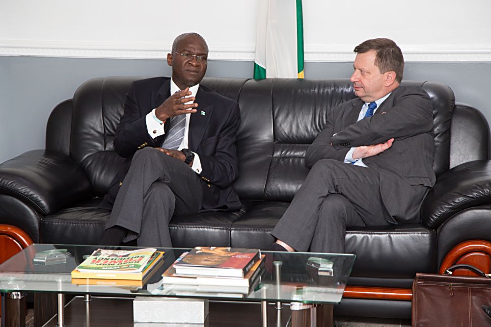 Hon Minister of Power Works  Housing Mr Babatunde Fashola SANleft and the British High Commissioner to Nigeria HE Mr Paul Arkwrightright to discuss issues relating to the development of the nations Power Sector  and Infrastructure with the Hon Minister  at the Ministry of Power Works  Housing Headquarters Mabushi Abuja on Tuesday 16th May 2017