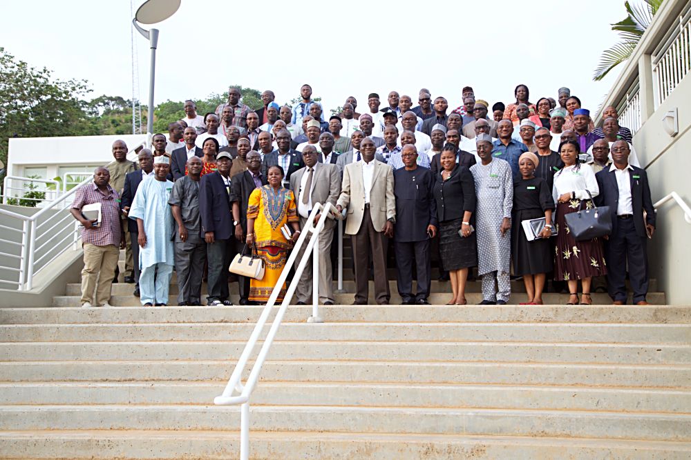 Hon Minister of Power Works  Housing Mr Babatunde Fashola SANmiddle in a group photograph with  Directors Heads of Departments and Agencies after Day One of the 3Day Retreat for Heads of Departments  Agencies under the Federal Ministry of Power Works  Housing at the Cedar Estate  Abuja on Thursday 18th  May 2017