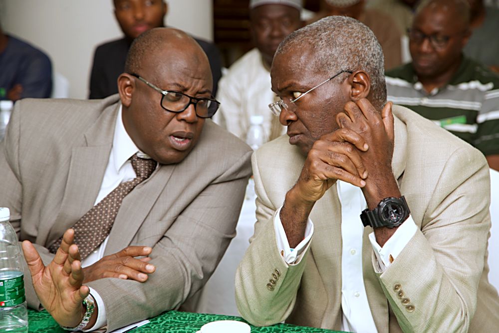 Hon Minister of Power Works  Housing Mr Babatunde Fashola SAN right and Permanent Secretary Works and Housing in the Ministry  Engr Abubakar  Magajileft during Day One of the 3Day Retreat for Heads of Departments  Agencies under the Federal Ministry of Power Works  Housing at the Cedar Estate  Abuja on Thursday 18th  May 2017