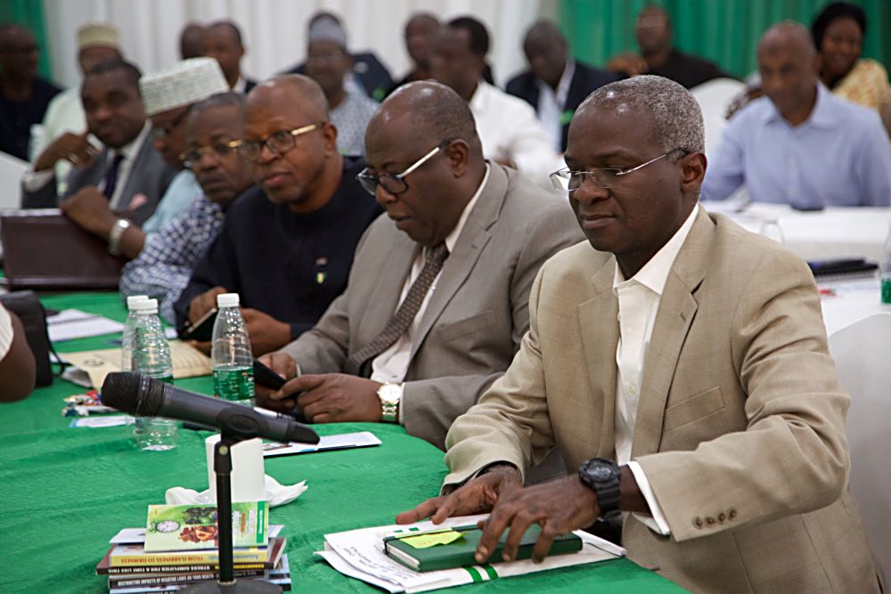 Hon Minister of Power Works  Housing Mr Babatunde Fashola SANright Permanent Secretary Works and Housing in the Ministry  Engr Abubakar  Magaji left former Director General Bureau of Public Procurement Engr Emeka Ezeh and others during Day One of the 3Day Retreat for Heads of Departments  Agencies under the Federal Ministry of Power Works  Housing at the Cedar Estate  Abuja on Thursday 18th  May 2017