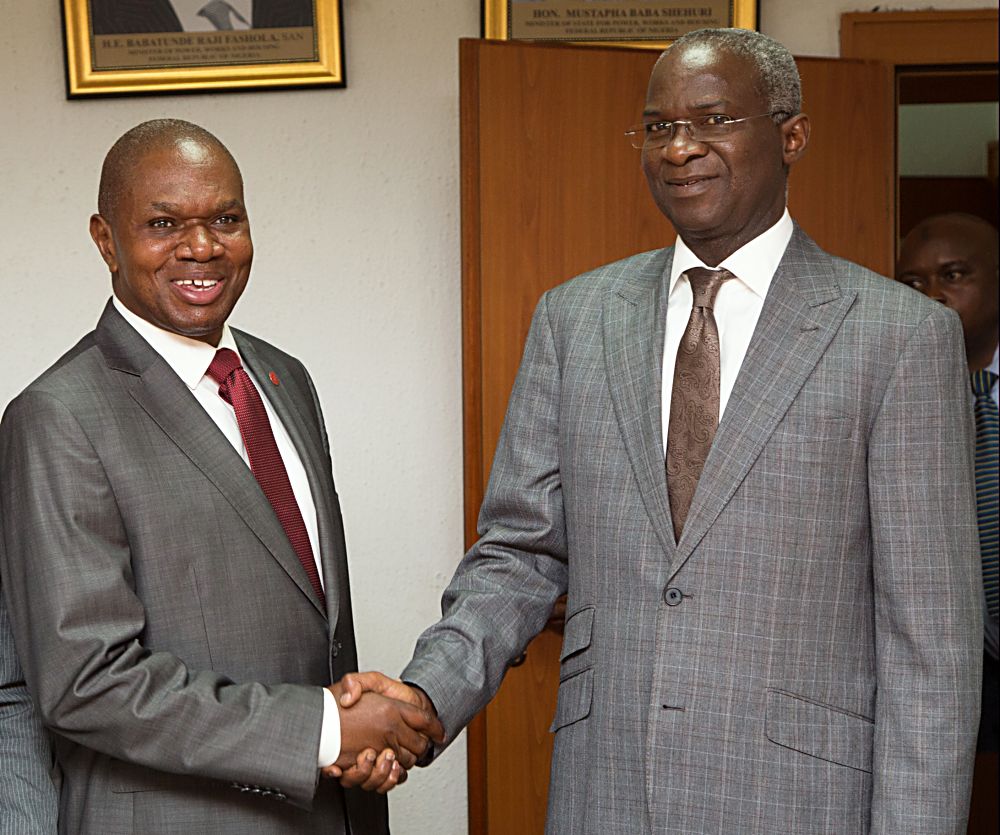 Hon Minister of Power Works  Housing Mr Babatunde Fashola SAN right and  United Nations Industrial Development OrganisationUNIDO Representative to Ecowas  Regional Director of the Nigeria Regional Office Hub Mr Jean Bakoleleft shortly after the courtesy visit to the Hon Minister at the Ministry of Power Works  Housing Headquarters Mabushi Abuja on Monday 22nd May 2017