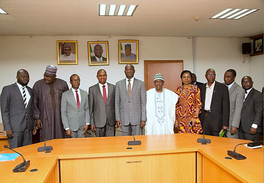 Hon Minister of Power Works  Housing Mr Babatunde Fashola SAN 5th leftthe Minister of State in the Ministry Hon Mustapha Baba Shehuri2nd left United Nations Industrial Development OrganisationUNIDO Representative to Ecowas  Regional Director of the Nigeria Regional Office Hub Mr Jean Bankole4th left UNIDO National Programme Officer Mr Reuben Bamidele3rd left UNIDO Energy Expert Mr Mustapha Alhaji left the Director Planning Research and Statistics Power Mrs Anne Atta 4th right  the Director Human Resources  Power Alhaji Chubado Mohammed Jada and others in a group photograph shortly after the courtesy visit to the Hon Minister at the Ministry of Power Works  Housing Headquarters Mabushi Abuja on Monday 22nd May 2017