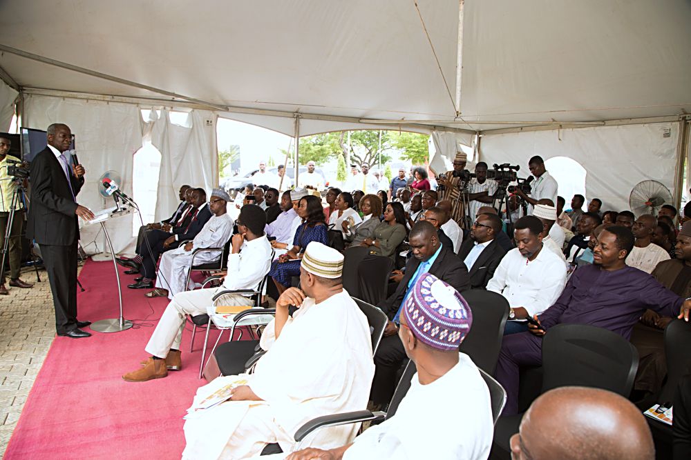 Hon Minister of Power Works  Housing Mr Babatunde Fashola SANleftaddressing the audience at the Commissioning of the 100kWP RoofTop Solar PV System at the House on the Rock The RefugeCitadel  Towers City GateAbuja on Tuesday 23 May 2017