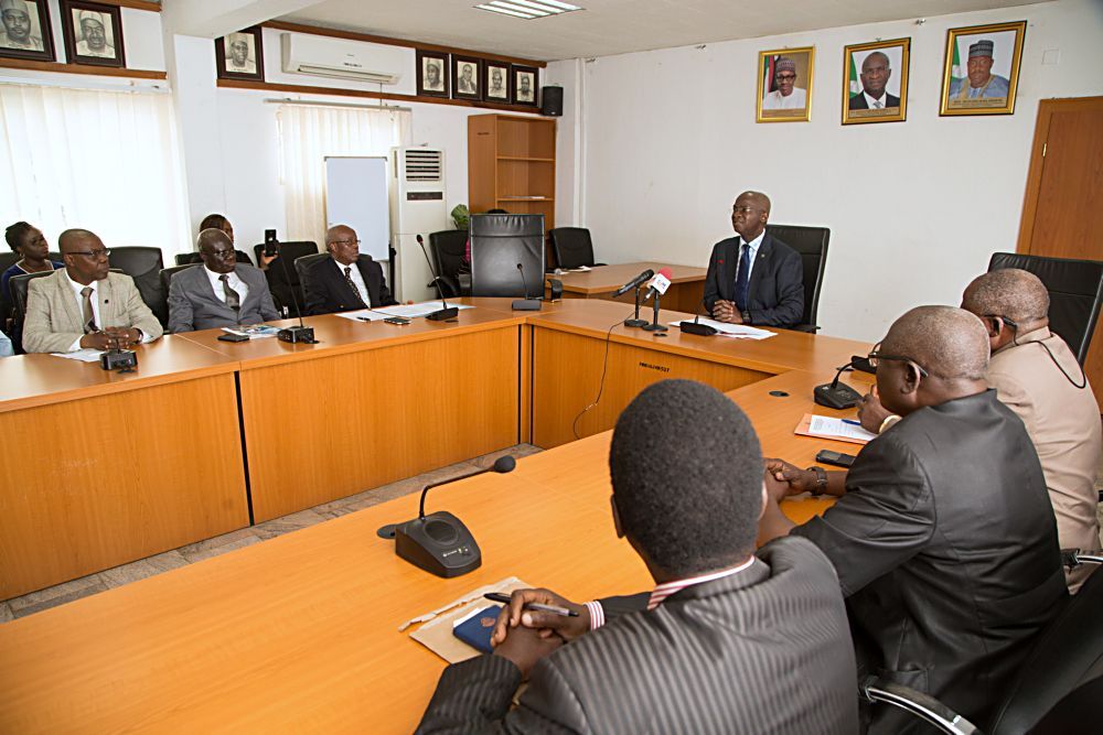 Hon Minister of Power Works  Housing Mr Babatunde FasholaSANmiddle Chairman Estate Surveyors and Valuers Registration Board of Nigeria ESV Yinka Sonaike3rd left Vice Chairman ESV Ozili Peter2nd left ESV Bolarinde Patunola Ajayi left and others during the inauguration of the Board of Estate Surveyors and Valuers Registration Board of Nigeria ESVARBON at the Ministry of PowerWorks  Housing Headquarters Mabushi  Abuja on Tuesday 30th May 2017