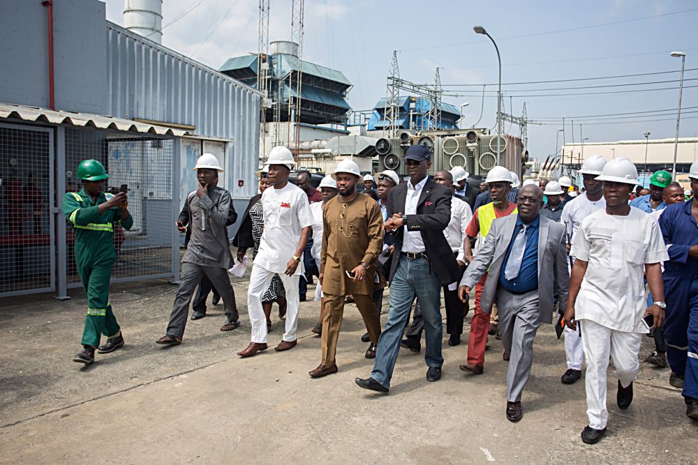 Hon Minister of Power Works  Housing Mr Babatunde Fashola SANmiddle  Managing DirectorChief Executive Officer Afam Power Plc Engr Olumide Noah Obademi right and Hon Member of the Rivers House of Assembly Mr Promise Chisom Dike left and others during the inspection tour of the Afam Power Plant in Portharcourt Rivers State on Thursday 8 June 2017