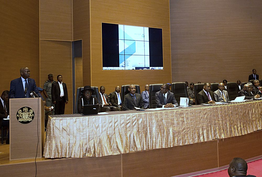 Hon Minister of Power Works  Housing Mr Babatunde Fashola SANleft presenting a Goodwill Message duringthe Opening Ceremony of the 3rdIIPEPNJI Annual Judges Workshop on Petroleum Gas and Power Sectors at the Aloysius Katsina Alu Seminar Block National Judicial Institute Abuja on Monday 19th June 2017