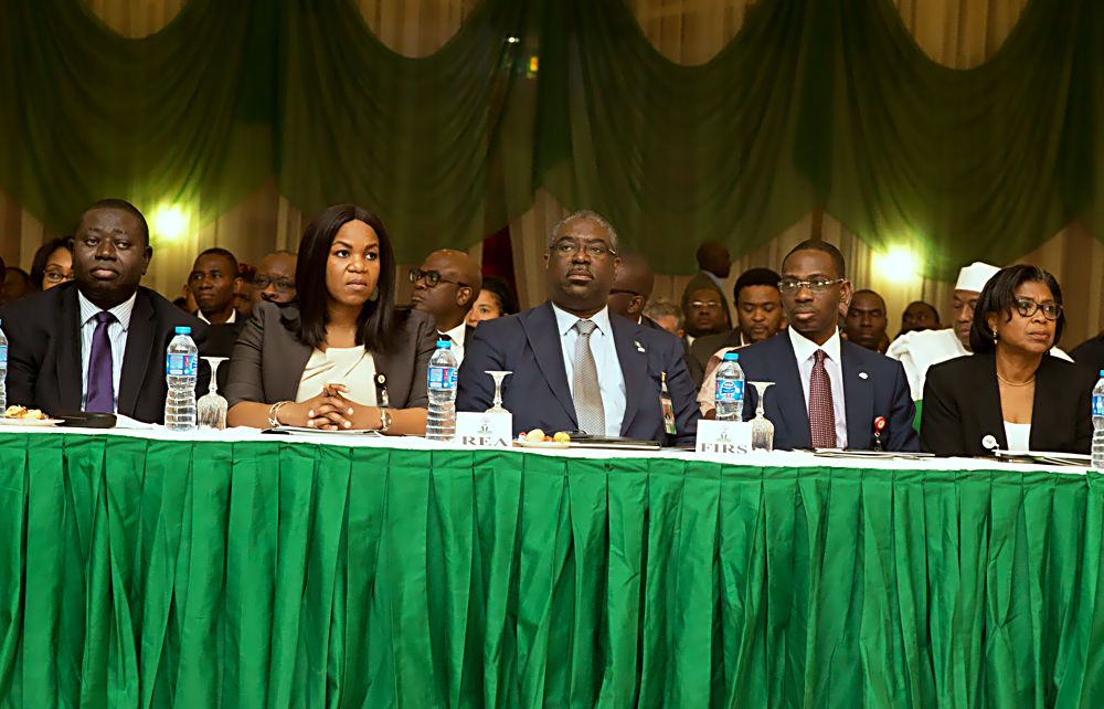 Managing DirectorCEO Rural Electrification Agency Mrs Damilola Ogunbiyi 2ndleft and Chairman Federal Inland Revenue Service Mr Babatunde Fowler middle and other participants during the 4thPresidential Quarterly Business Forum which focused on two themes the Power Sector and Public Revenue Generation at the Banquet Hall Presidential Villa Abuja on Tuesday 11th July 2017