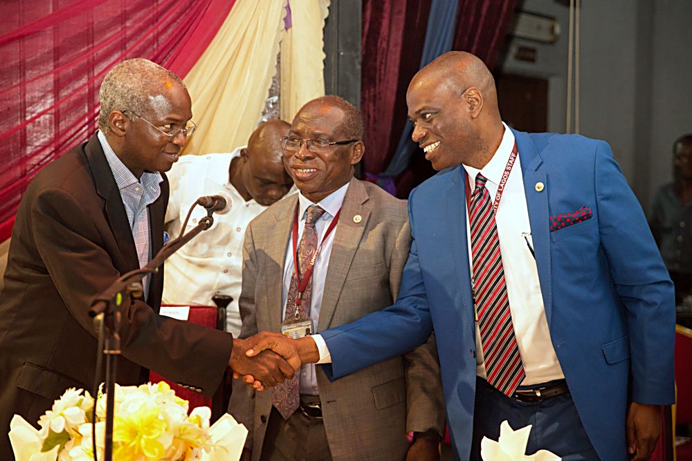 Hon Minister of Power Works  Housing Mr Babatunde FasholaSANleftVice Chancellor University of Lagos Prof Rahamon Bellomiddle and Deputy Vice Chancellor Prof Oluwatoyin Ogundiperight during the Department of Economics 2017 Distinguished Public Lecture Series delivered by the Minister on the topic Power Sector Reforms  Challenges and the Way Forward at the JF Ade Ajayi Auditorium Former Main Auditorium University of Lagos on Thursday 13th July 2017