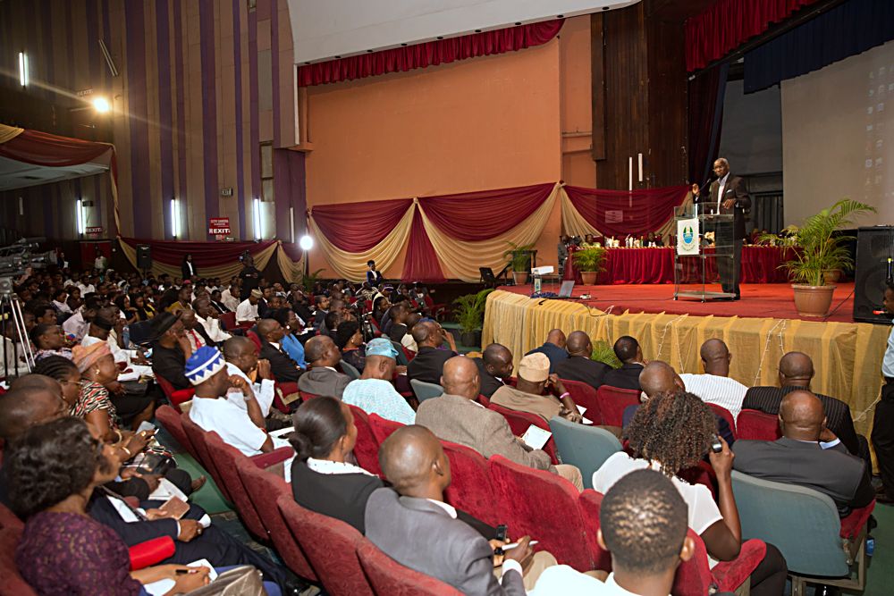 Hon Minister of Power Works  Housing Mr Babatunde Fashola SAN right delivering a lecture  on the topic Power Sector Reforms  Challenges and the Way Forward at the Department of Economics 2017 Distinguished Public Lecture Series held at the JF Ade Ajayi Auditorium Former Main Auditorium University of Lagos on Thursday 13th July 2017