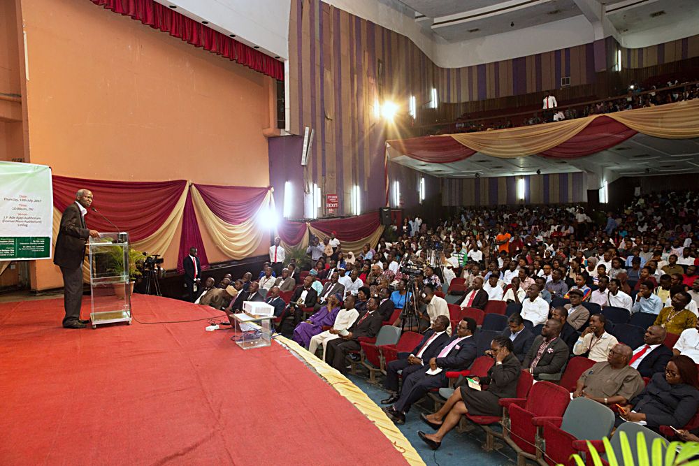 Hon Minister of Power Works  Housing Mr Babatunde Fashola SAN right delivering a lecture  on the topic Power Sector Reforms  Challenges and the Way Forward at the Department of Economics 2017 Distinguished Public Lecture Series held at the JF Ade Ajayi Auditorium Former Main Auditorium University of Lagos on Thursday 13th July 2017