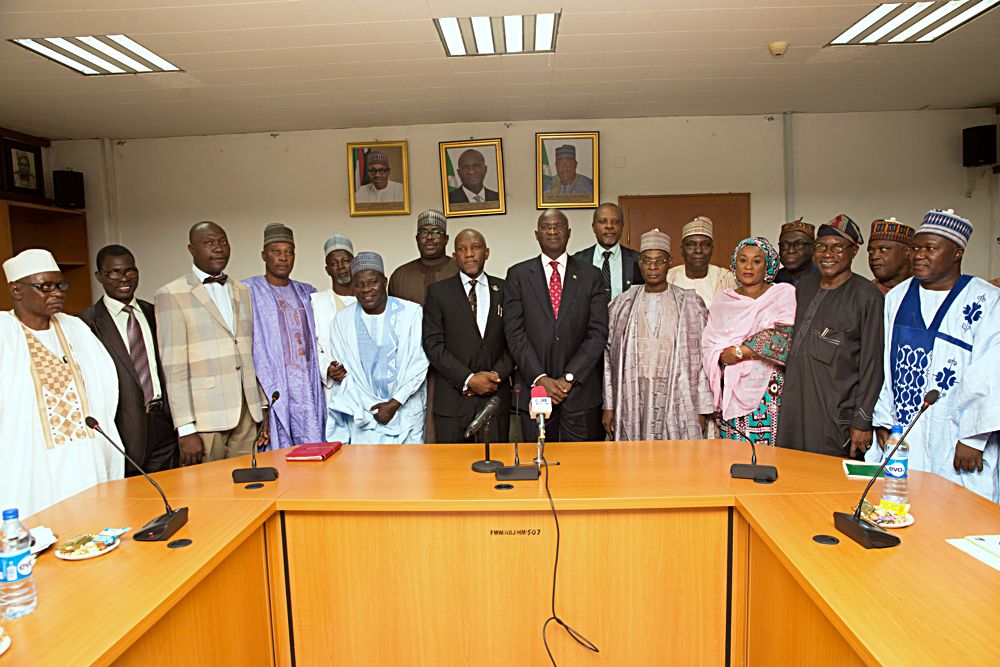 Hon Minister of Power Works  Housing Mr Babatunde Fashola SAN 5th right Minister of State Hon Mustapha Baba Shehuri 6th left Permanent Secretary Works  Housing Mr Muhammed Bukar4th right Director in the Ministry Mrs Salma Mohammed 3rd right and Chairman Council of Registered Builders of Nigeria CORBON Prof Kabir Bala 7th left  and others in a group photograph shortly after the inauguration of CORBON at the Ministry of Power Works  Housing Headquarters Mabushi Abuja on Tuesday 18th July 2017