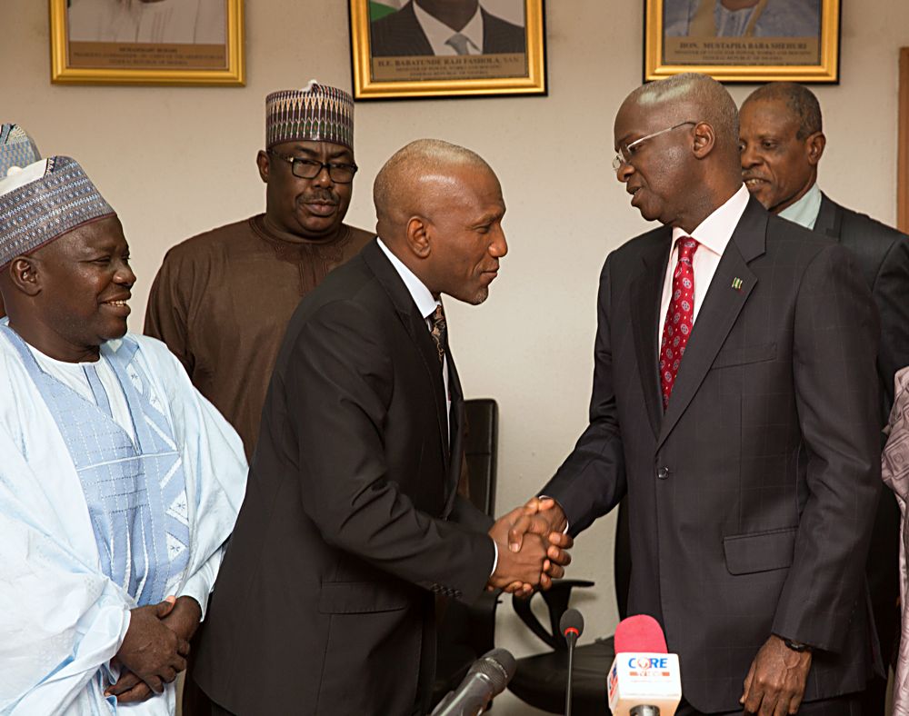 Hon Minister of Power Works  Housing Mr Babatunde Fashola SAN right Minister of State Hon Mustapha Baba Shehuri 2nd  left and Chairman Council of Registered Builders of NigeriaCORBONProf Kabir Bala 2nd right  and others shortly after the inauguration of CORBON at the Ministry of Power Works  Housing Headquarters Mabushi Abuja on Tuesday 18th July 2017