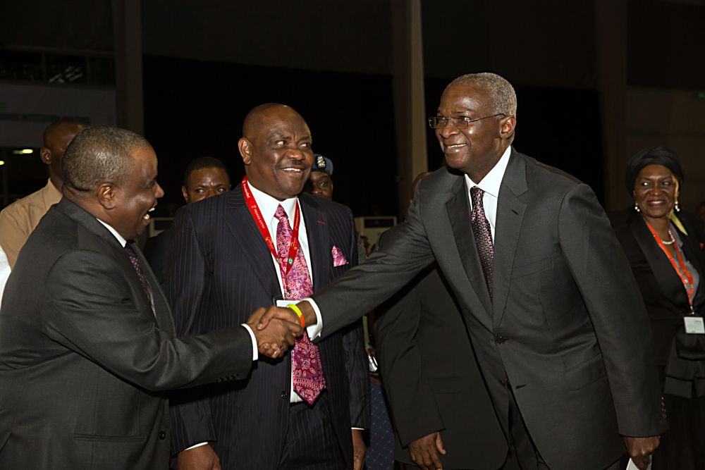 Representative of the Vice President and Hon Minister of Power Works  Housing Mr Babatunde FasholaSAN right Governor of Sokoto State Hon Aminu Waziri Tambuwal left and Governor of Rivers State Chief Nyesom Ezenwo Wike middle during the Opening Ceremony of the Nigerian Bar Association 2017 Annual General Conference with the theme African Business Penetrating Through Institution Building at the Landmark Centre Eti  Osa Lagos on Sunday 20th August 2017