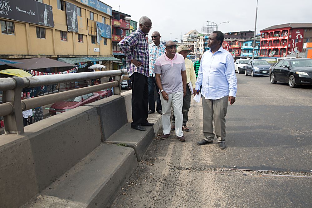 Hon Minister of Power Works  HousingMr Babatunde FasholaSANleftDirector Highways Construction and Rehabilitation in the Ministry Engr Yemi Oguntominiyimiddle and Director Highways SouthWest Engr Emmanuel Adeoye right during the inspection of the undulation points on Apongbon Bridge slated for repairs by the Federal Government and other selected roads in Lagos on Saturday 2nd September  2017